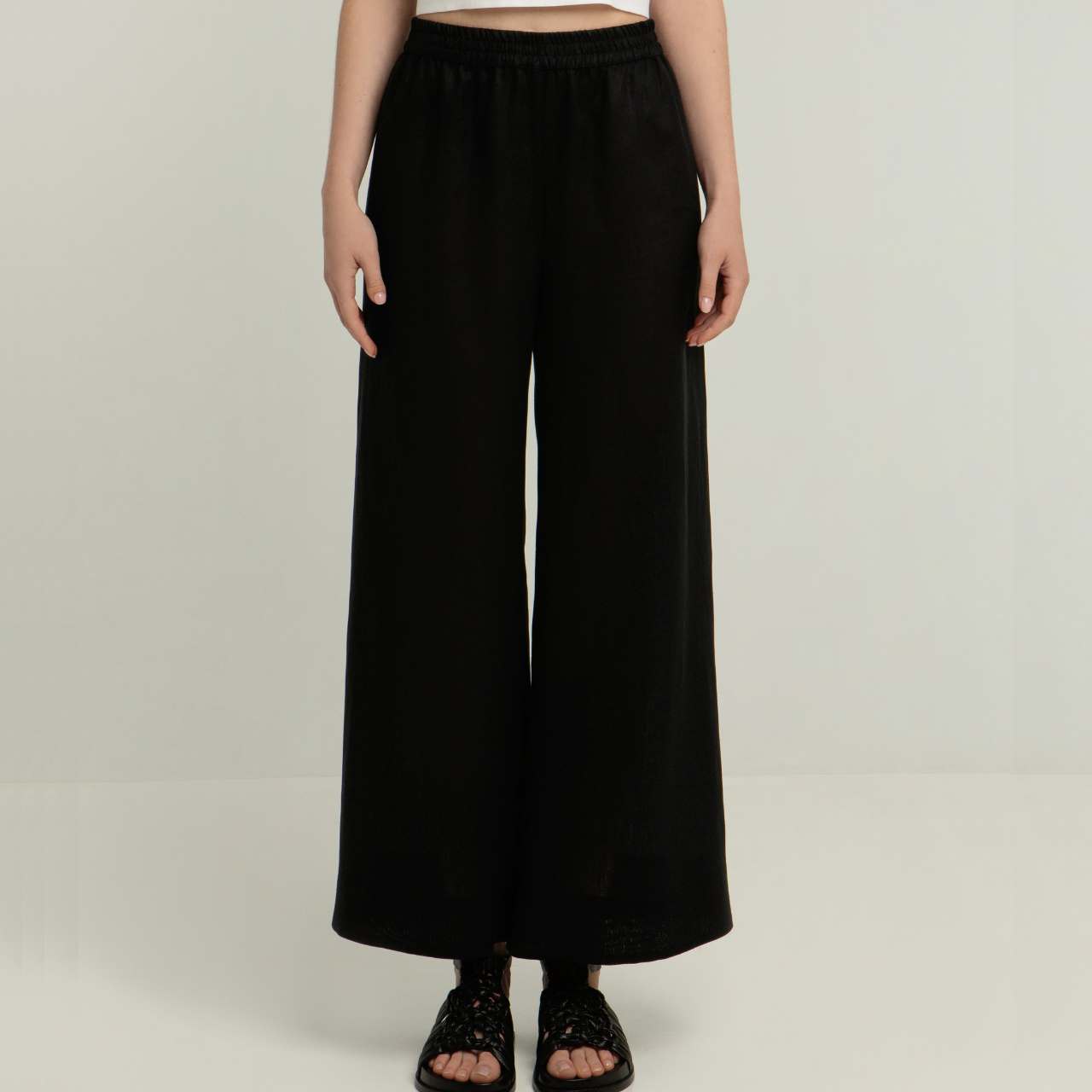 Greek Archaic Kori Black Flared Linen Trousers | Caroline