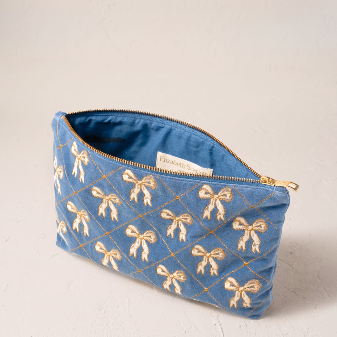 Pressed Lattice Bows Everyday Velvet Pouch In Dusky Blue