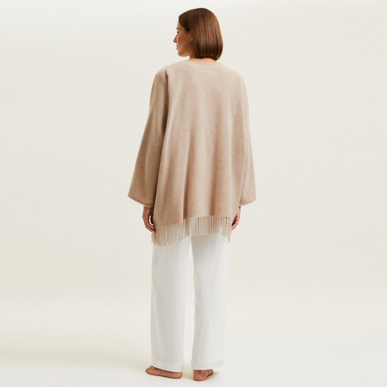 Laurence Tavernier Eponyme Wool Short Poncho in Barley | Caroline